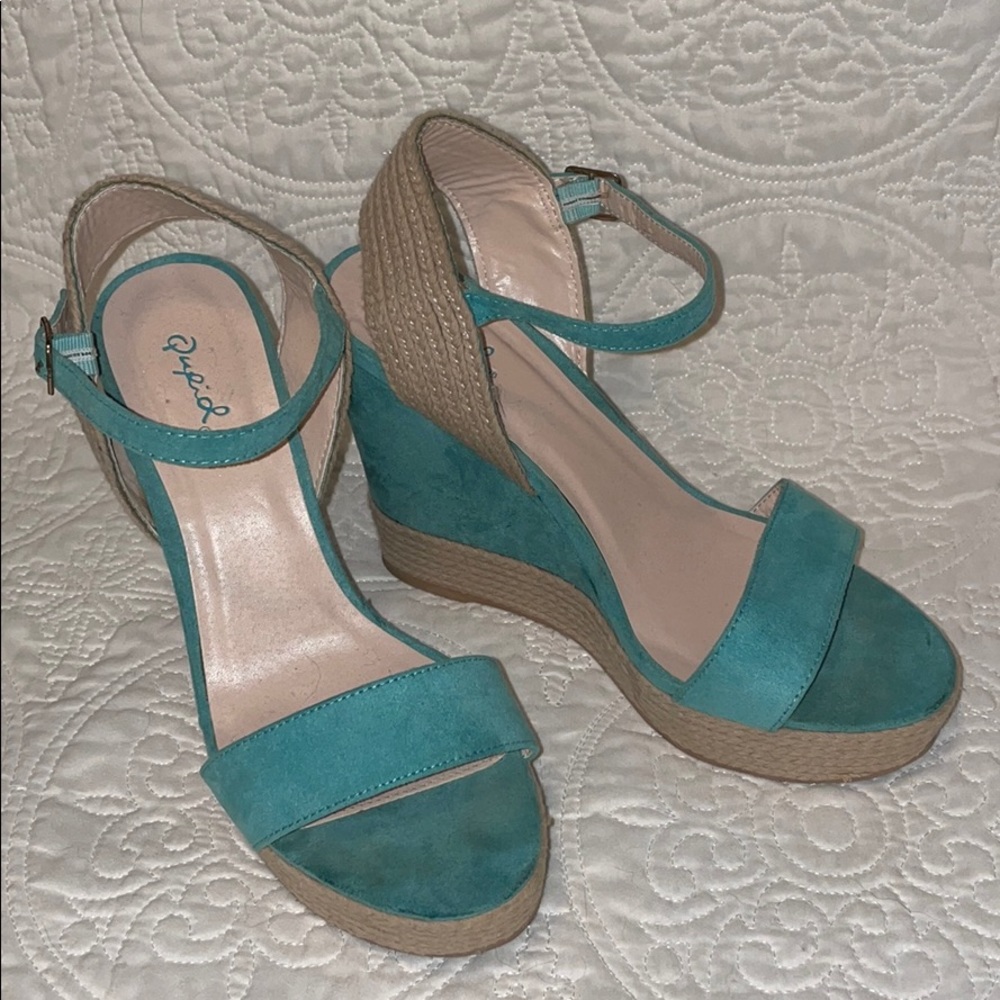 Teal suede wedges.